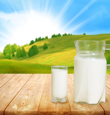 Pitcher of milk on tableの写真素材
