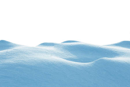 A large beautiful snowdrift isolated on white background.Winter snow background. A big snow driftの写真素材
