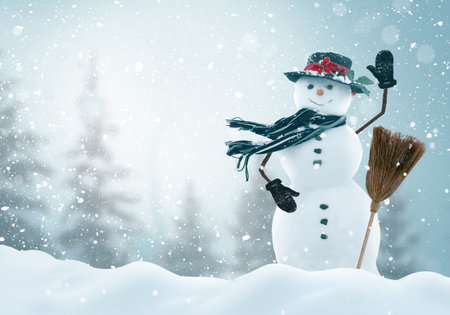 Greeting card with copy-space.Happy snowman standing in winter landscape.Snow background.Winter fairytale.の写真素材