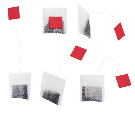 Set of top and side views of tea bags with tags isolated on white backgroundの写真素材