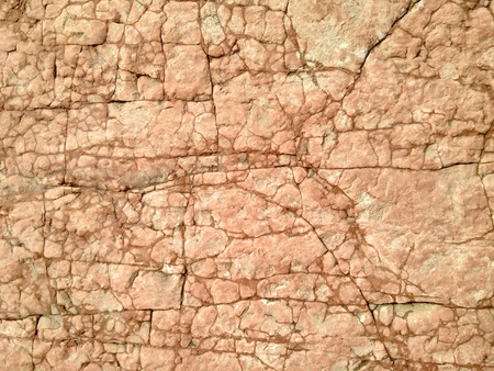 Stone textured background. Rough brown rocky surfaceの写真素材