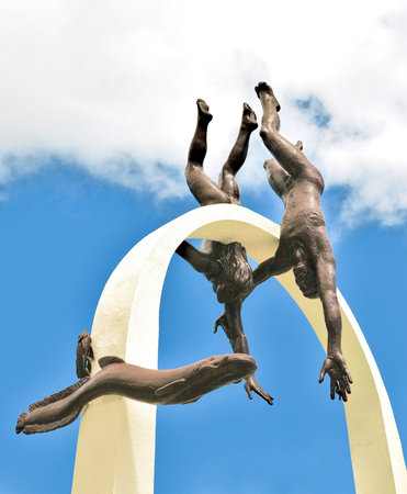 PITSUNDA, ABKHAZIA - JULY 25, 2016: Sculptural composition "Divers" at blue sky backgroundのeditorial素材