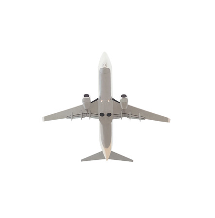 Bottom view of passenger airplane. Airliner isolated on white backgroundの写真素材