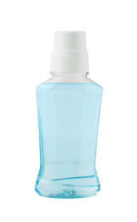 Transparent bottle with blue oral rinse for fresh breath and dental care isolated on white backgroundの写真素材