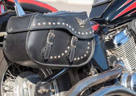 Closeup of leather motorcycle chopper bag with studsの写真素材