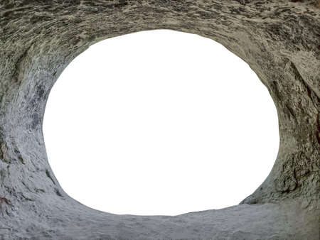 View from inside of cave or stone grotto hole in rocky mountainsの写真素材