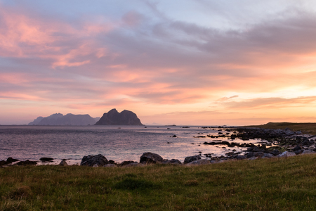 Scenic cloudscape with sunrise over the Lofoten islands in Norway in summerの写真素材