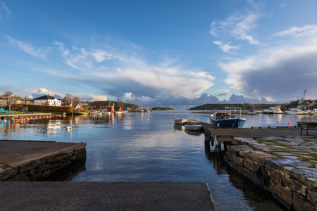 Lillesand, Norway - November 10, 2017: View of the harbour ocean and sky. Seen from Lillesand City.のeditorial素材