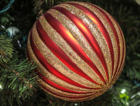 Christmas tree decoration ball with shiny glitters の写真素材