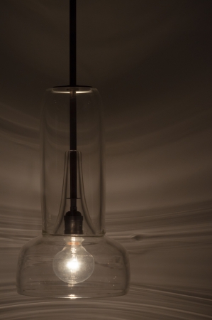 Lamp made of colorless glass, transparent to see the bulb の写真素材