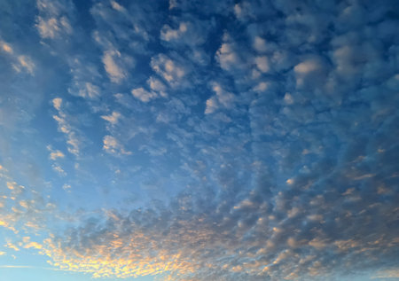 Clouds in the blue sky at sunset as a background image.
