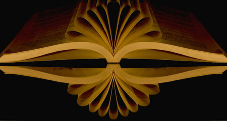 Open book on a black background. 3d rendering. Computer digital drawing.
