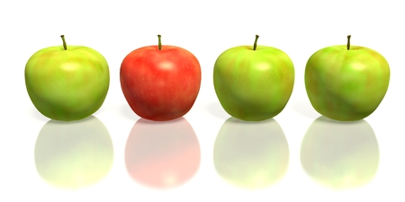 One red apple between three green apples on white backgroundの写真素材