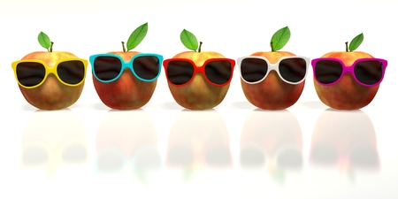 five apples with colorful sunglassesの写真素材