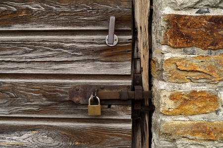 wooden door with lockの写真素材