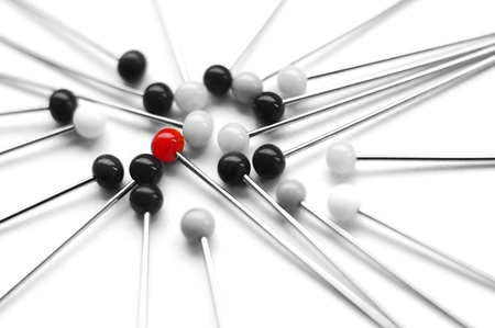 Pins - one red pinheadの写真素材