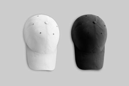 Baseball cap presented in white and black colors. Mock isolated on a gray background. Ready for your design. 3d rendering.の写真素材