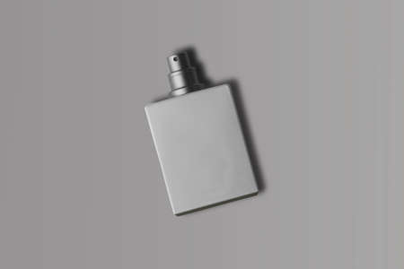 Empty blank white perfume cosmetic bottle Mock up isolated on a gray background. 3d renderingの写真素材
