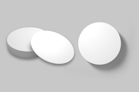 Empty White Round Blank Beer Coasters mockup template Isolated on a gray background. 3d rendering.の写真素材