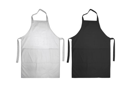 Blank black and white apron with strap and pockets mockup set, top view, 3d rendering. Empty cooking protection bib mock up, isolated. Clear profession chief or maid skirting mockuの写真素材