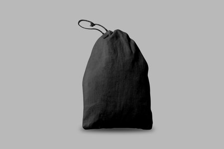 Black shoe or sport bag mockup isolated on background. 3d rendering.Sport drawstring backpack, gym sack. Cinch tote bag black front view. Knapsack, schoolbag, rucksack with ropes.の写真素材