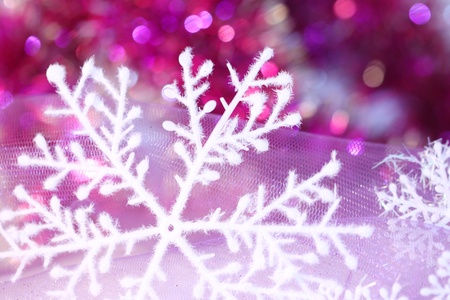 holiday snowflake on violet backgroundの写真素材