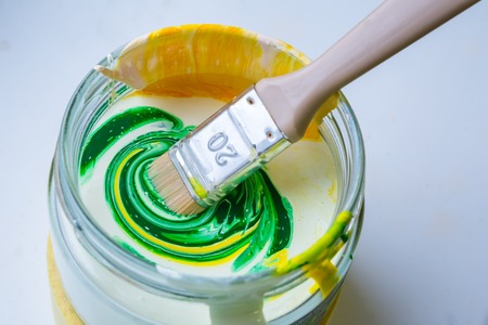 Materials for repair, paints, brushes, chalk, mixing of colors spatula dyesの写真素材