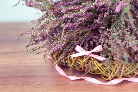 spring composition, nest with eggs near the bunch of heather, Easter. place for textの写真素材