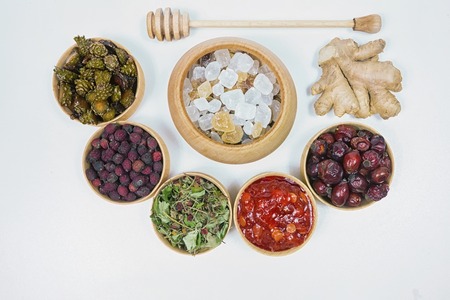 tea for health, ginger tea, flax, grass, strawberries, cones, hawthorn, canina-roseの写真素材