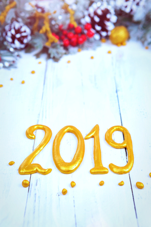 new year wooden background with snow branch. Top view with copy space for your text 2019の写真素材