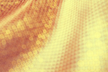 texture of the fabric, side, background of fabric in the highlight. golden colorの写真素材
