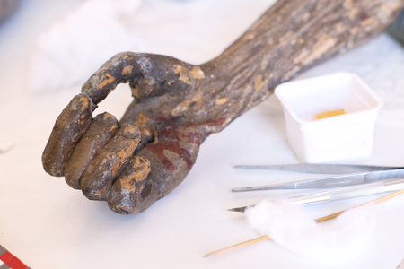 gold with carvings on the old icon. restoration of the icon, gold restoration, old icon, old painting, restoration. conservation of paintingsの写真素材