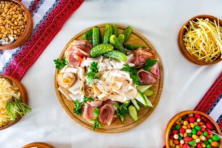 Served for a banquet table. Wine glasses with napkins, glasses and salads.の写真素材