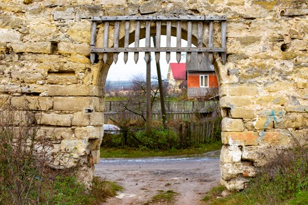 The old ruins of the collapsed walls with gates and windows Staroselskiy castle in Stare Selo in the Lviv region in Ukraineの写真素材