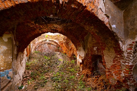 The old ruins of the collapsed walls with gates and windows Staroselskiy castleの写真素材