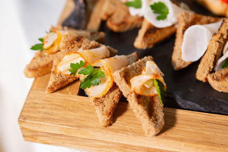 Delicious Appetizer Served on a Wooden Platter With Fresh Herbs