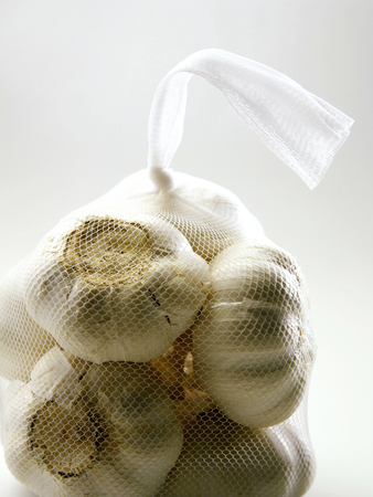 A packet of garlic bulbsの写真素材