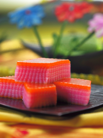 Malaysia food-stack of kueh lapis on a plateの写真素材