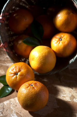 Mandarin oranges in a basketの写真素材