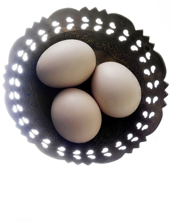 top view of eggs in a metal trayの写真素材