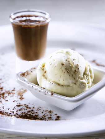 ice cream with chocolate pot by the sideの写真素材