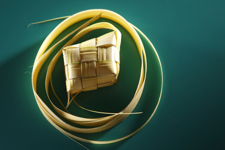 ketupat rounded with young coconut leafの写真素材