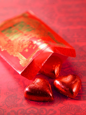 Heart shape chocolate inside Ang Pow packet