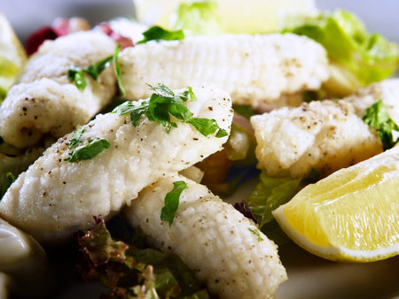 sand and pepper squid on table ready to eat