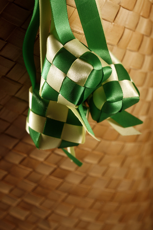 ddecoration ribbon ketupat at the checker matの写真素材
