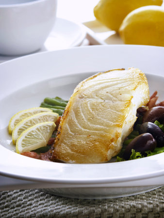studio shot of grill fish on the plate