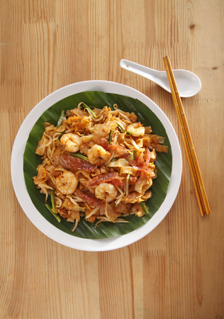 Top view of malaysian famous food Penang fried kuey teowの写真素材
