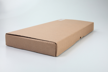 brown cardboard box on the plain backgroundの写真素材