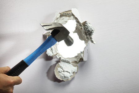 breaking or tear down a wallの写真素材