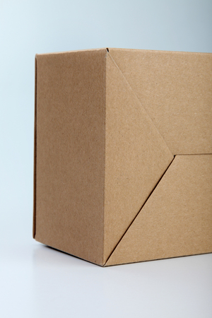 brown cardboard box on the plain backgroundの写真素材